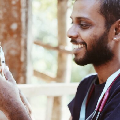 WECare vet Kasro vaccinating dogs against rabies in Sri Lanka